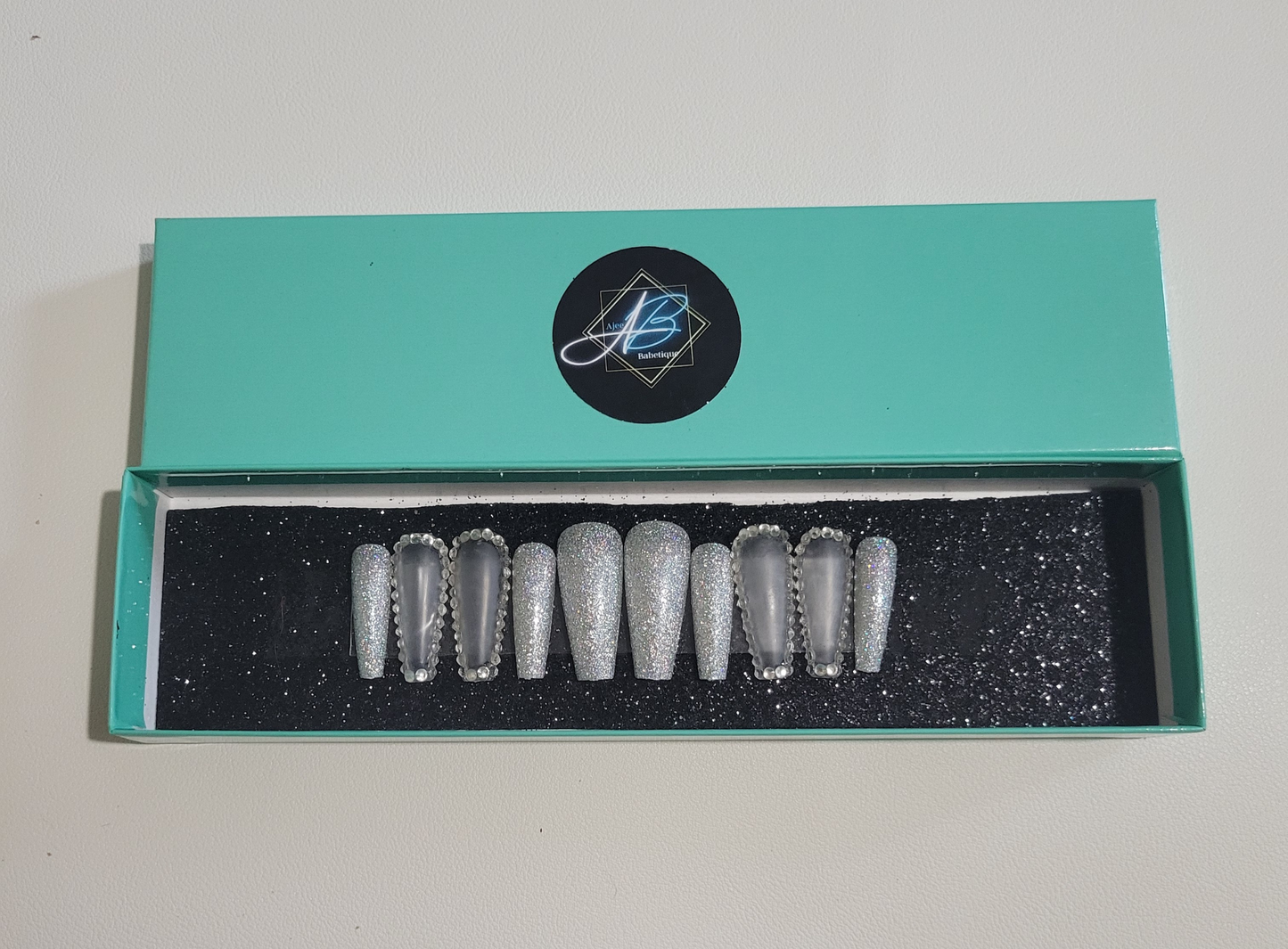 Clearly, it's Sparkly Press On Nails